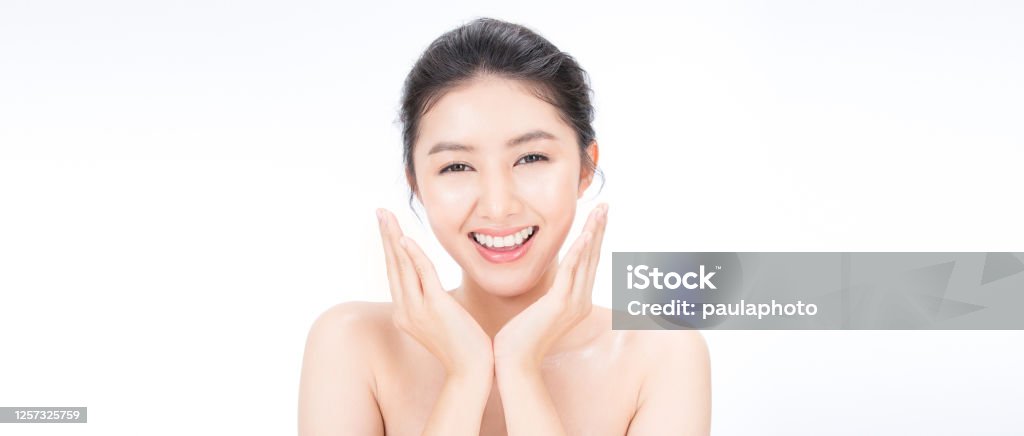 Closeup portrait of asian woman clear healthy perfect skin care spa isolated on white background, asian beautiful Korean girl smile face. Beauty clinic glow makeup facial treatment surgery concept